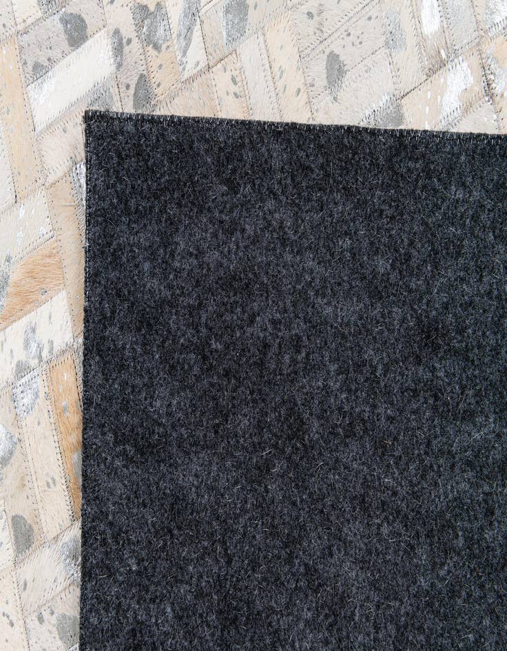 Detail image of  4' 11 x 8' 1 Cowhide Stocks Rug