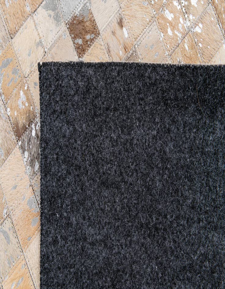 Detail image of  5' 2 x 7' 5 Cowhide Stocks Rug