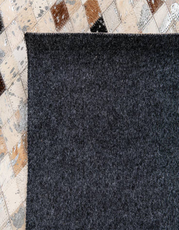 Detail image of  5' 1 x 7' 7 Cowhide Stocks Rug