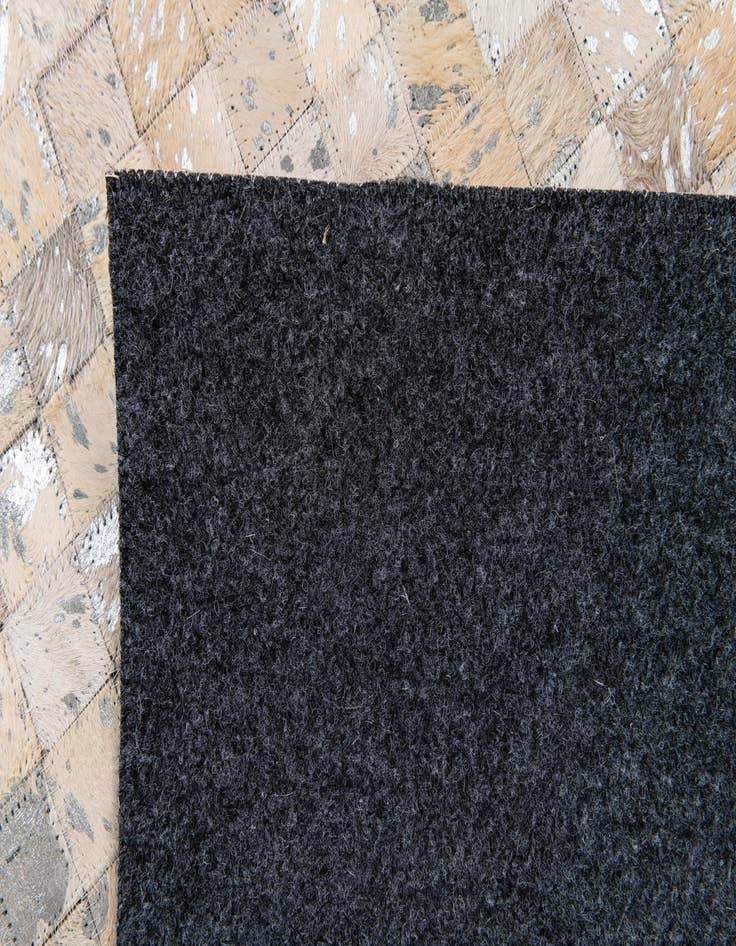 Detail image of  5' 4 x 7' 6 Cowhide Stocks Rug
