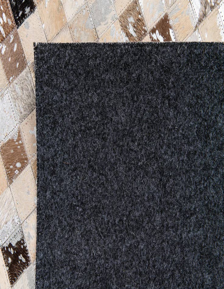 Detail image of  5' 3 x 7' 6 Cowhide Stocks Rug