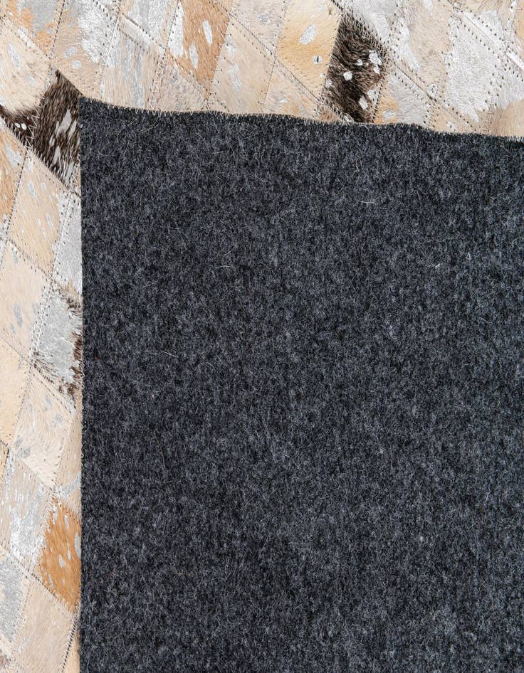 Detail image of  5' 5 x 7' 8 Cowhide Stocks Rug