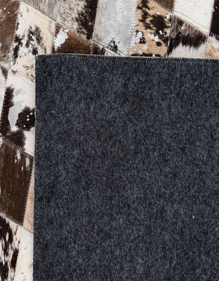 Detail image of  8' 3 x 9' 11 Cowhide Stocks Rug