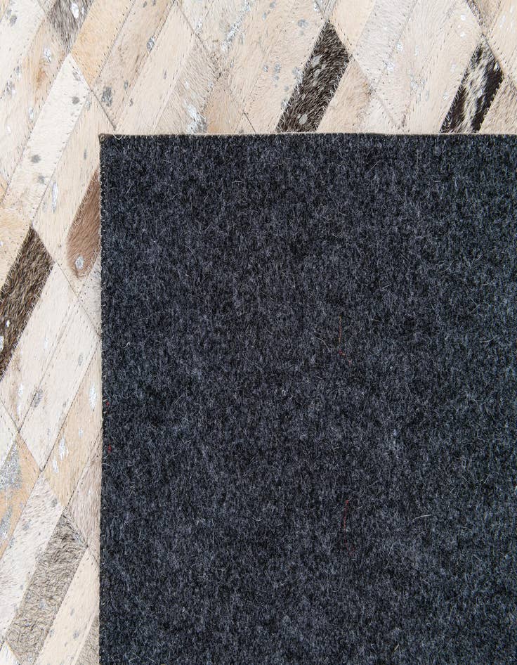 Detail image of  7' 11 x 9' 11 Cowhide Stocks Rug