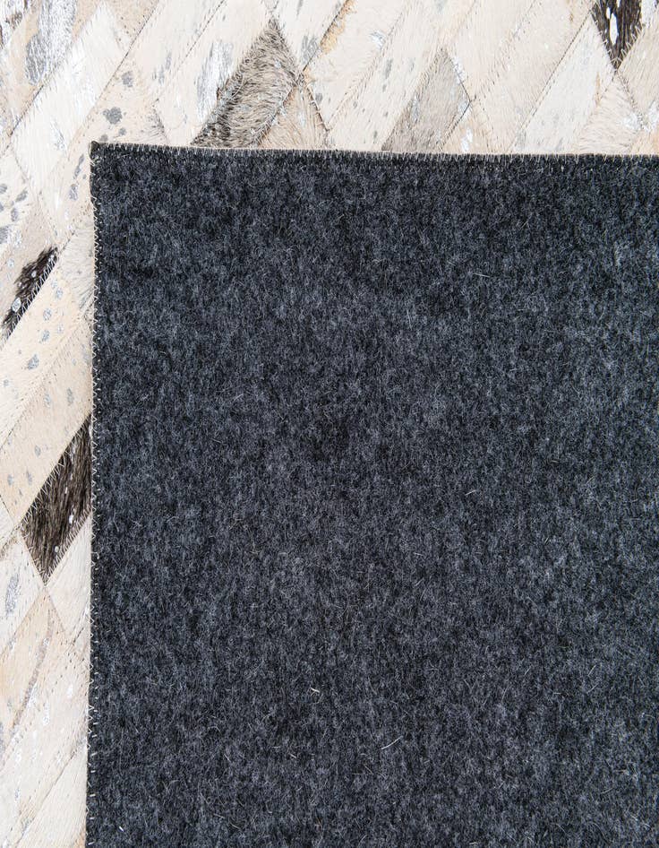 Detail image of  7' 11 x 9' 11 Cowhide Stocks Rug