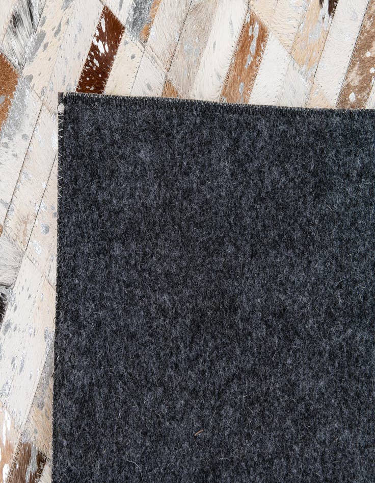 Detail image of  7' 11 x 9' 11 Cowhide Stocks Rug