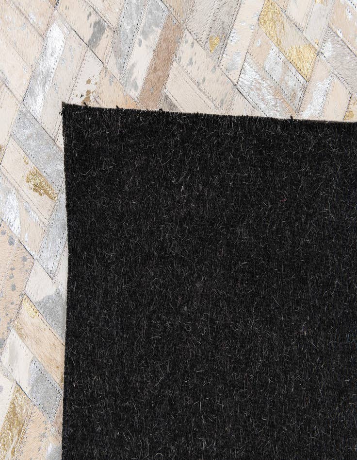 Detail image of  7' 11 x 9' 11 Cowhide Stocks Rug