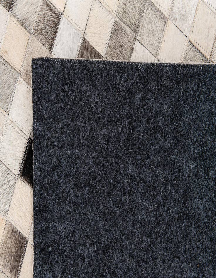 Detail image of  8' 1 x 9' 11 Cowhide Stocks Rug