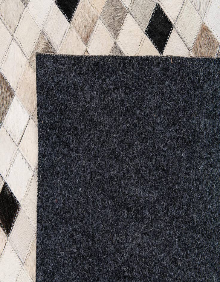 Detail image of  8' x 9' 10 Cowhide Stocks Rug