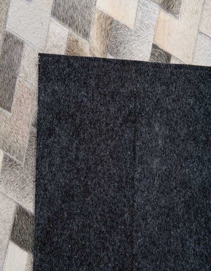 Detail image of  5' 7 x 7' 10 Cowhide Stocks Rug