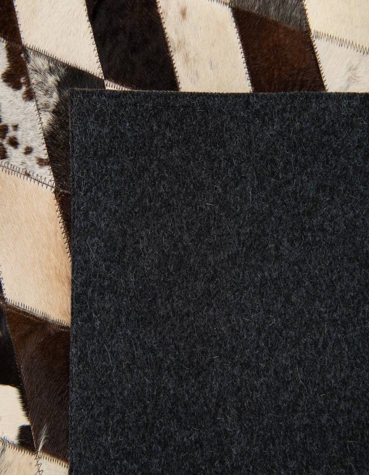 Detail image of  5' 8 x 8' Cowhide Stocks Rug