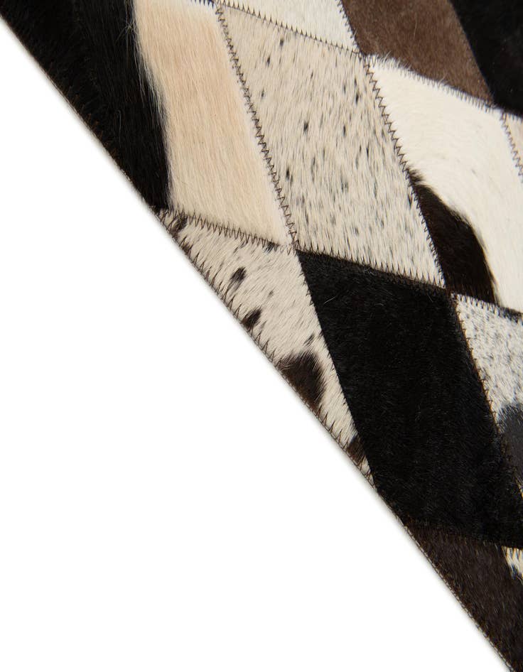 Detail image of  5' 7 x 8' Cowhide Stocks Rug