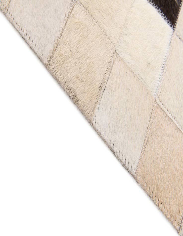 Detail image of  5' x 7' 9 Cowhide Stocks Rug