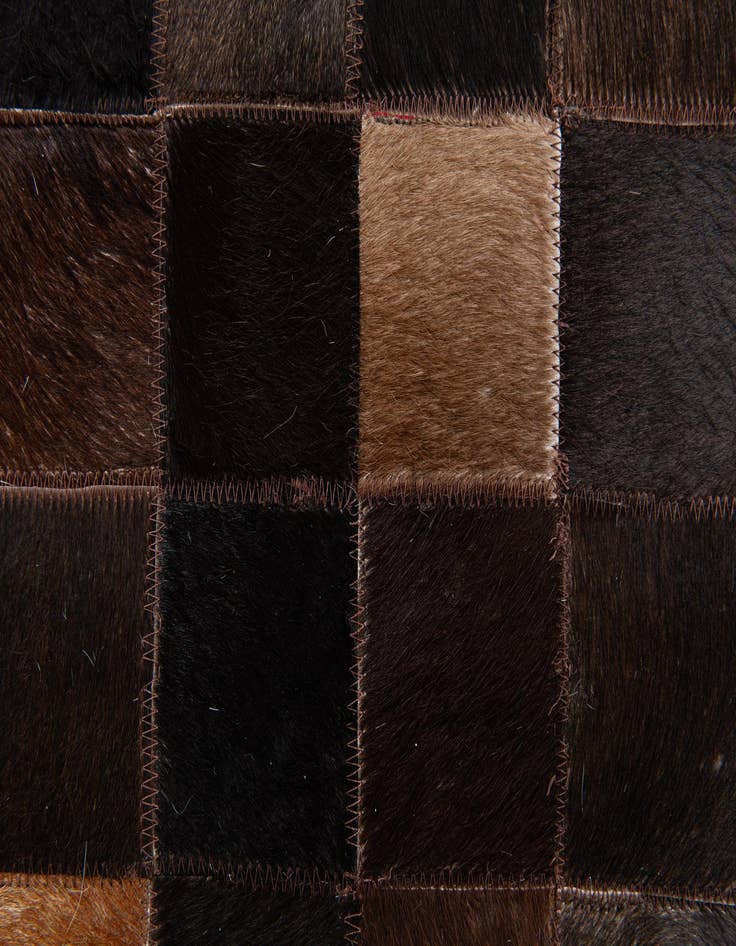 Detail image of  5' x 7' 9 Cowhide Stocks Rug