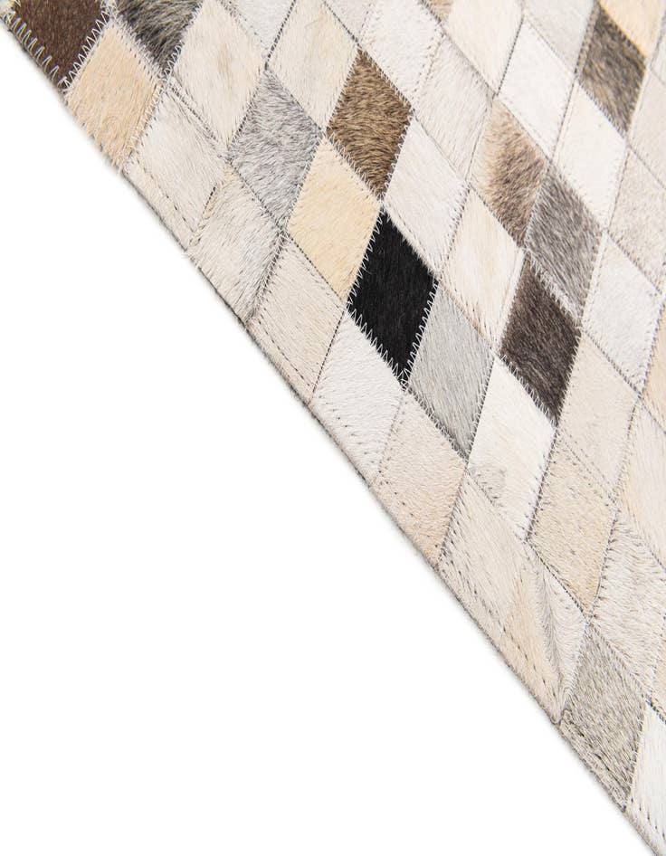 Detail image of  5' x 7' 11 Cowhide Stocks Rug