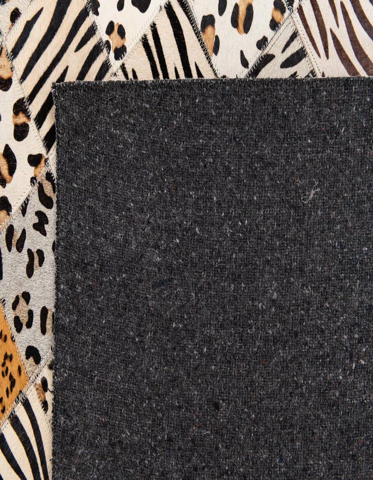 Detail image of  5' 1 x 8' Cowhide Stocks Rug