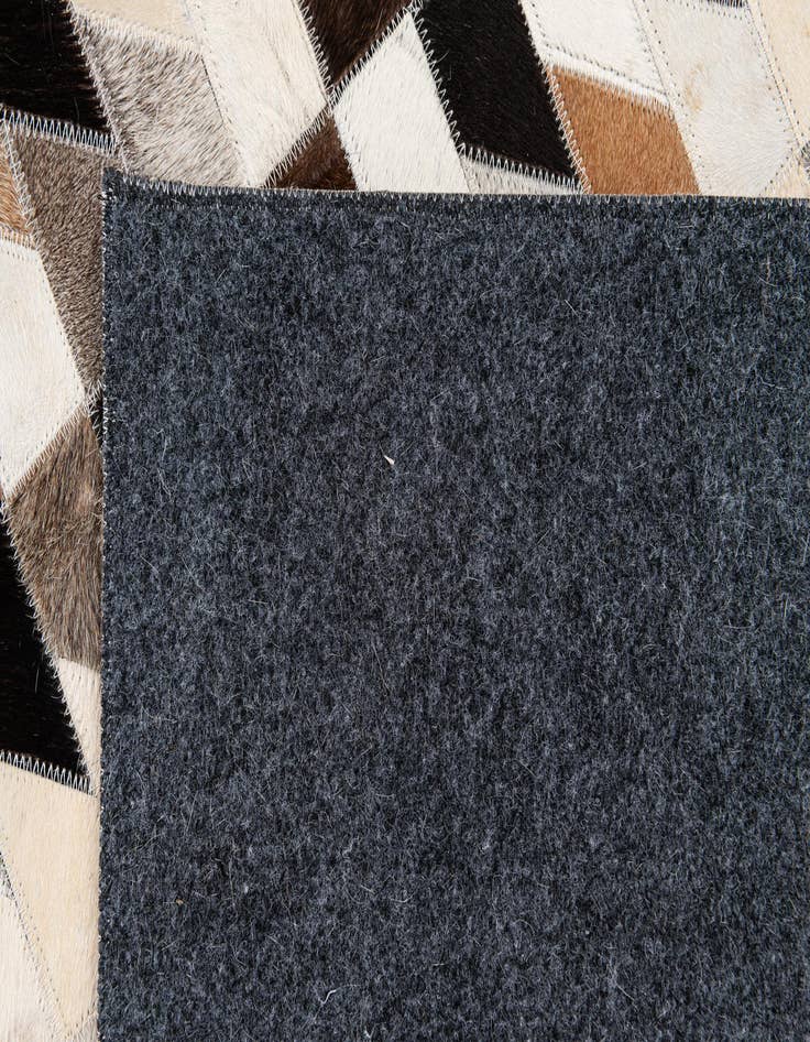 Detail image of  5' x 8' Cowhide Stocks Rug