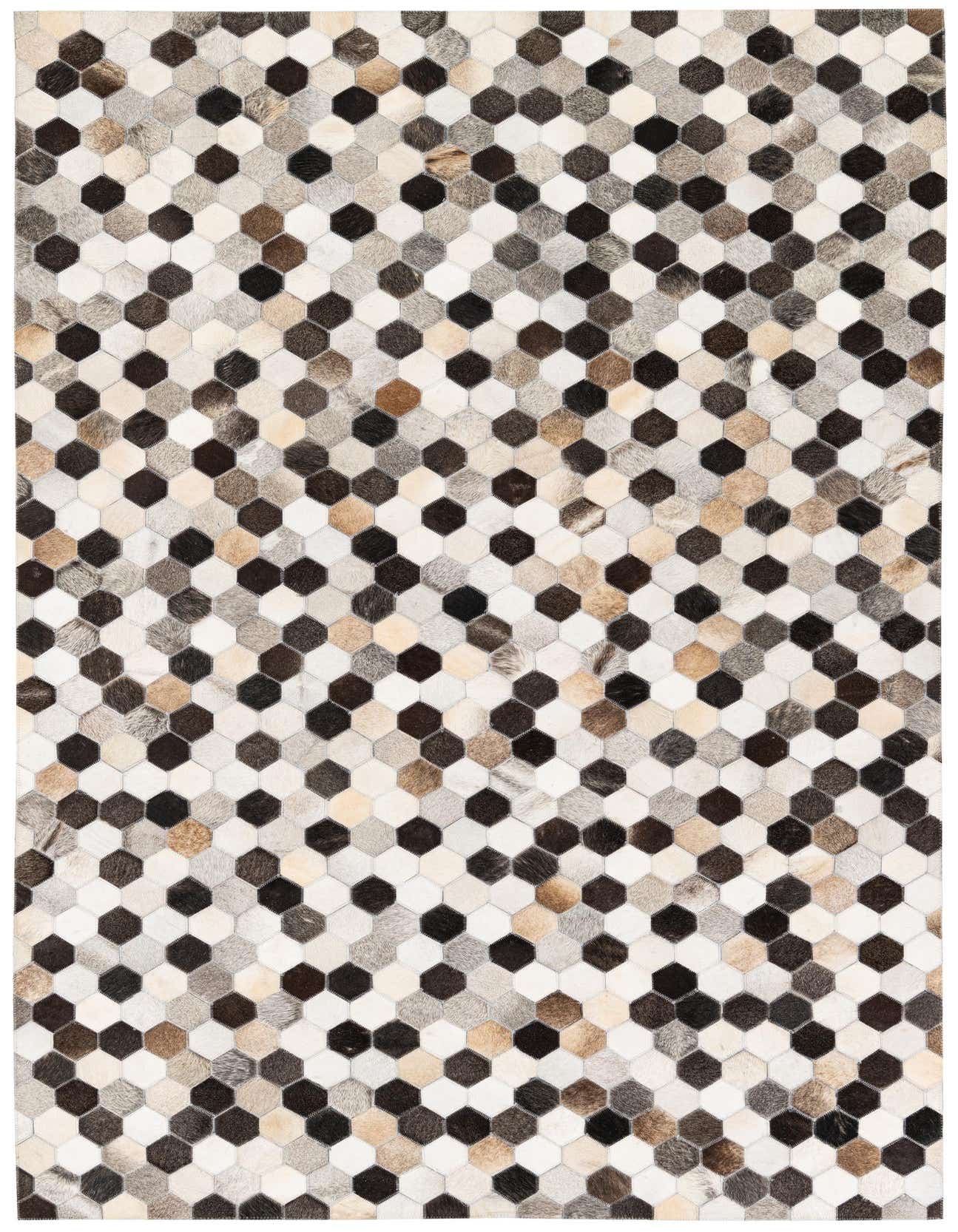 A 5x8 rectangular Cowhide Stocks rug featuring a modern hexagonal patchwork in multi-colored natural cowhide and leather.
