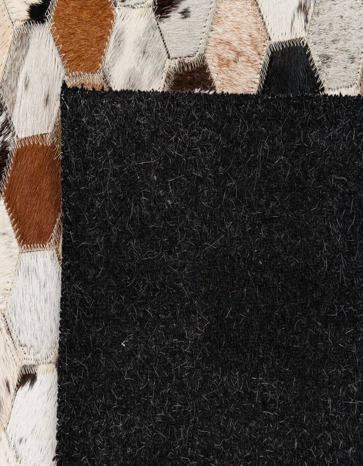 Detail image of  5' x 7' 10 Cowhide Stocks Rug