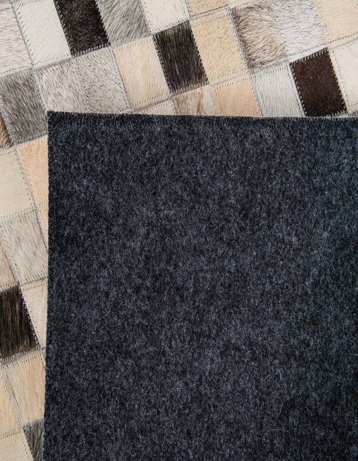 Detail image of  5' 7 x 7' 10 Cowhide Stocks Rug