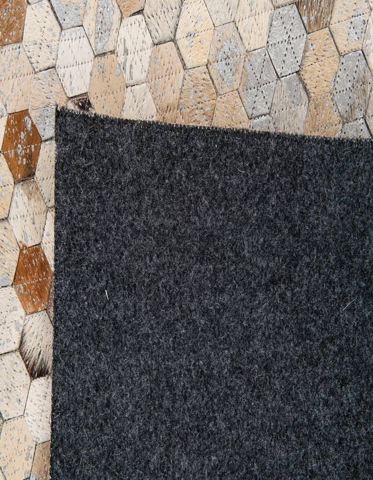 Detail image of  5' 3 x 7' 7 Cowhide Stocks Rug