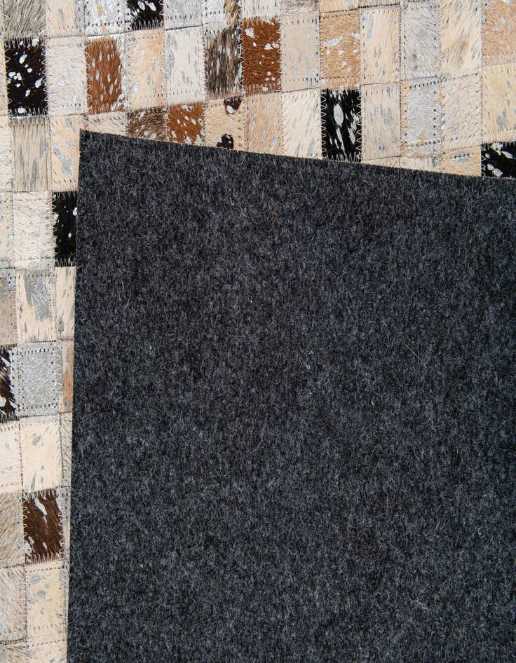 Detail image of  5' 3 x 7' 6 Cowhide Stocks Rug