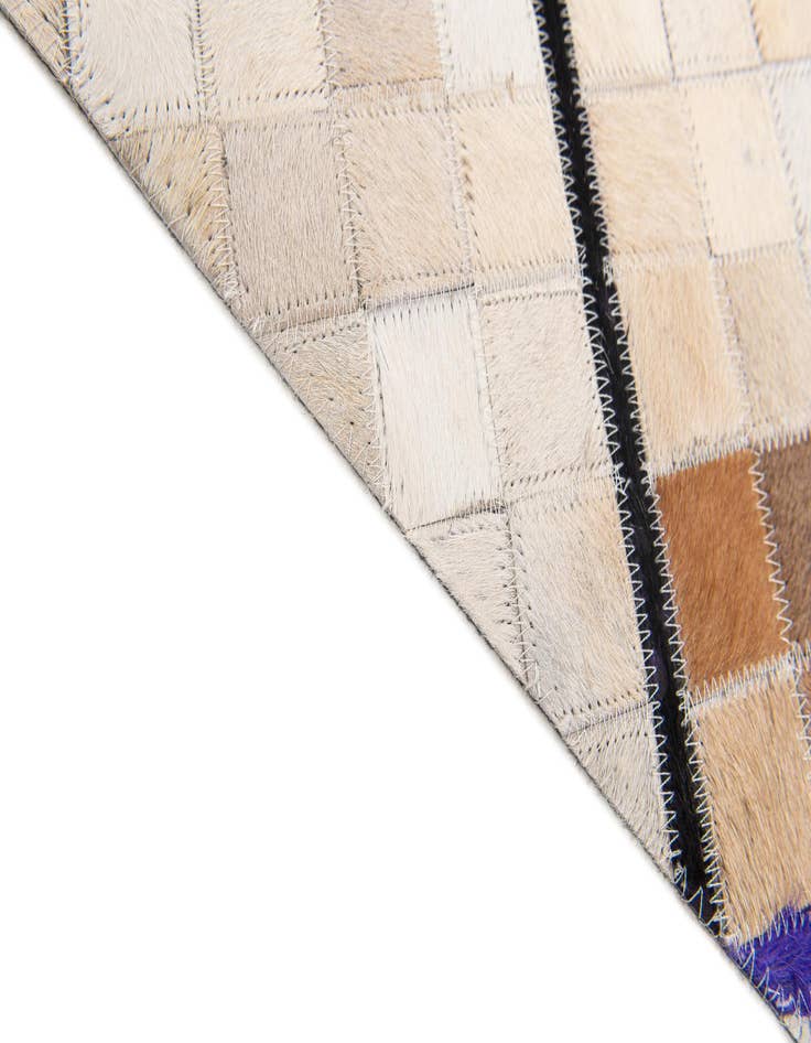 Detail image of  5' x 7' 11 Cowhide Stocks Rug