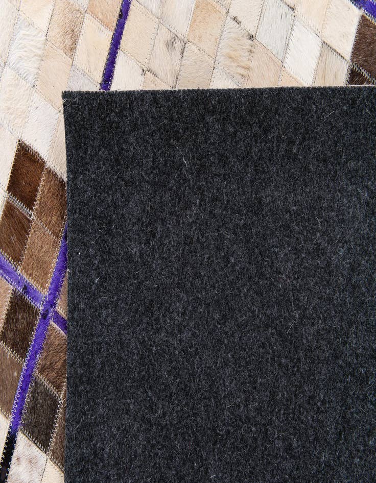 Detail image of  5' x 8' Cowhide Stocks Rug