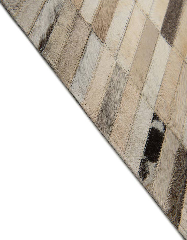 Detail image of  5' 1 x 7' 11 Cowhide Stocks Rug