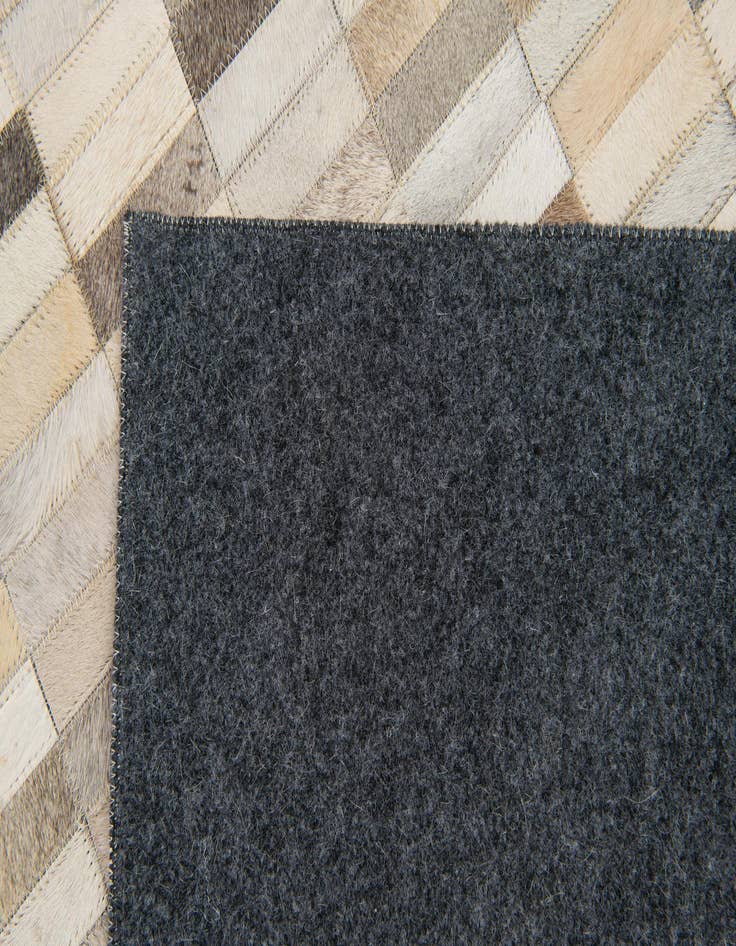Detail image of  5' 1 x 7' 11 Cowhide Stocks Rug