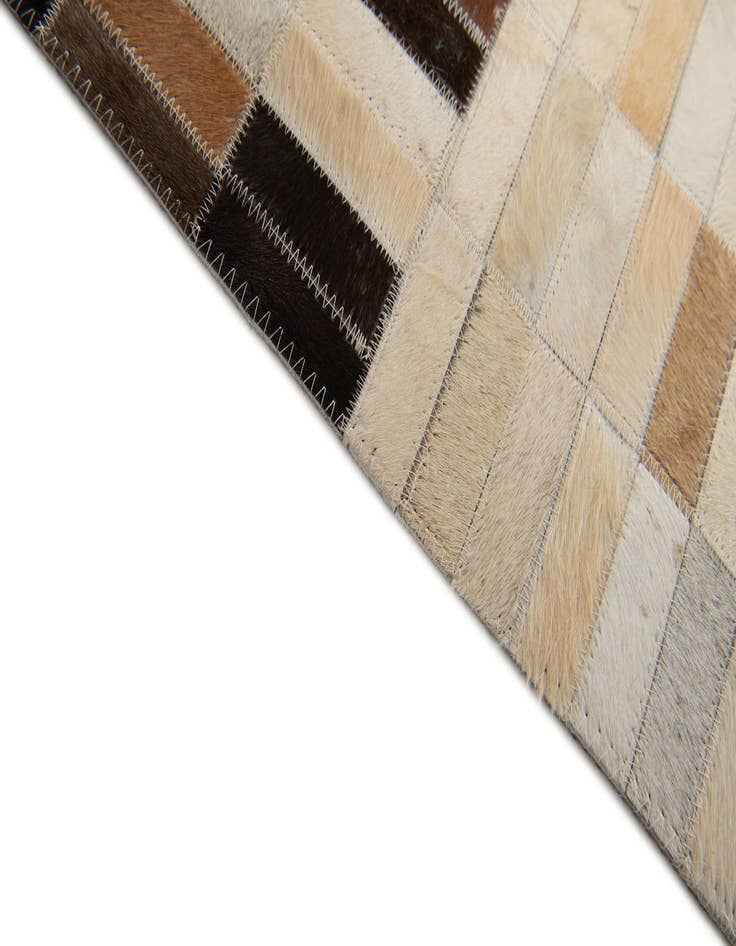 Detail image of  5' x 7' 11 Cowhide Stocks Rug
