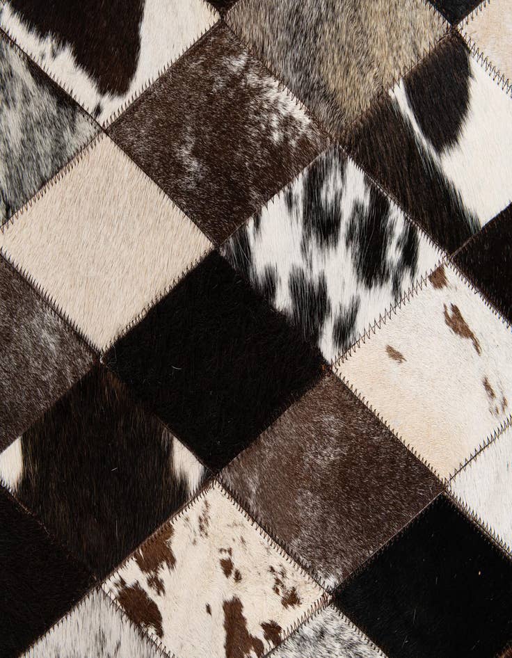 Detail image of  5' 2 x 8' 1 Cowhide Stocks Rug