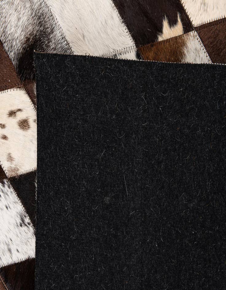 Detail image of  5' 2 x 8' 1 Cowhide Stocks Rug