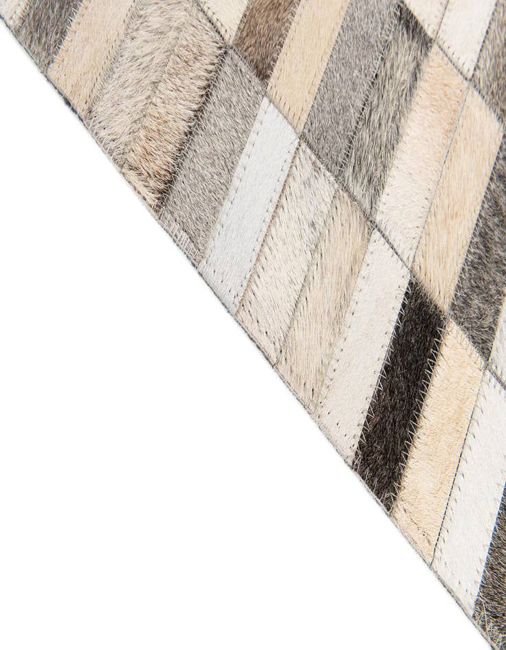 Detail image of  5' 1 x 8' Cowhide Stocks Rug