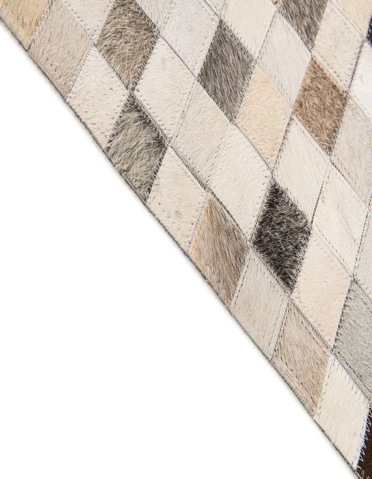 Detail image of  5' x 7' 11 Cowhide Stocks Rug