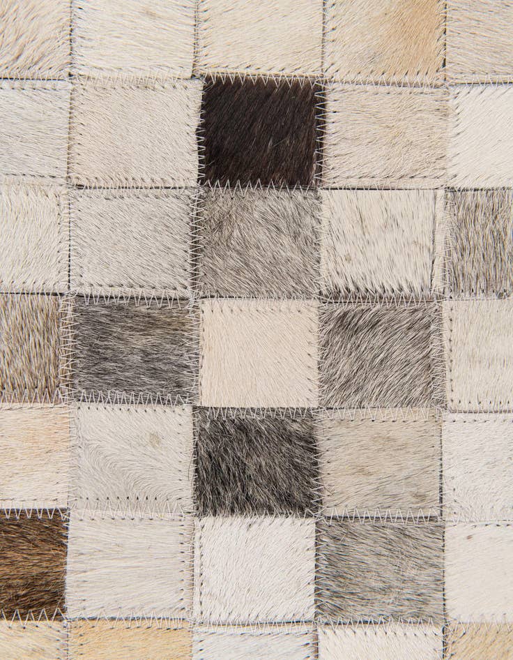 Detail image of  5' x 7' 11 Cowhide Stocks Rug
