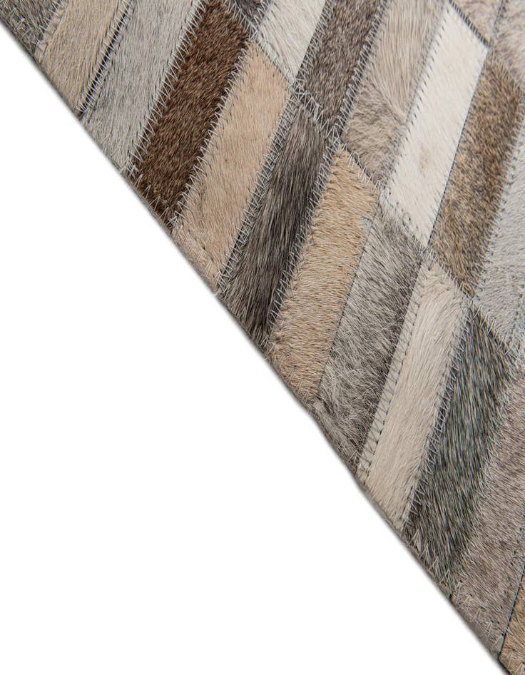 Detail image of  5' 3 x 8' Cowhide Stocks Rug