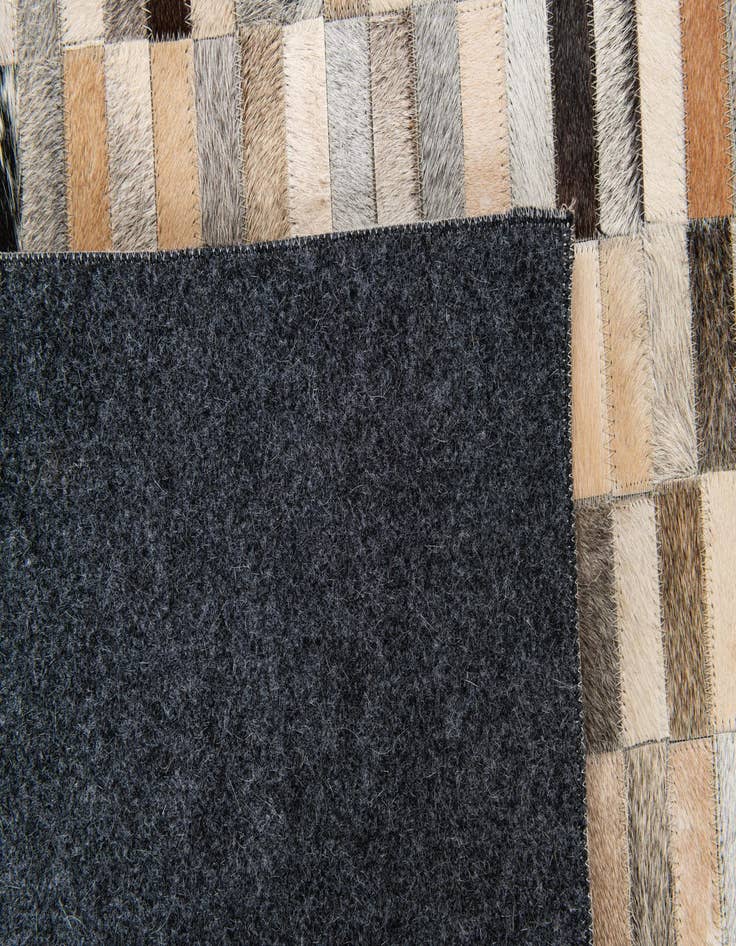Detail image of  5' 1 x 7' 11 Cowhide Stocks Rug