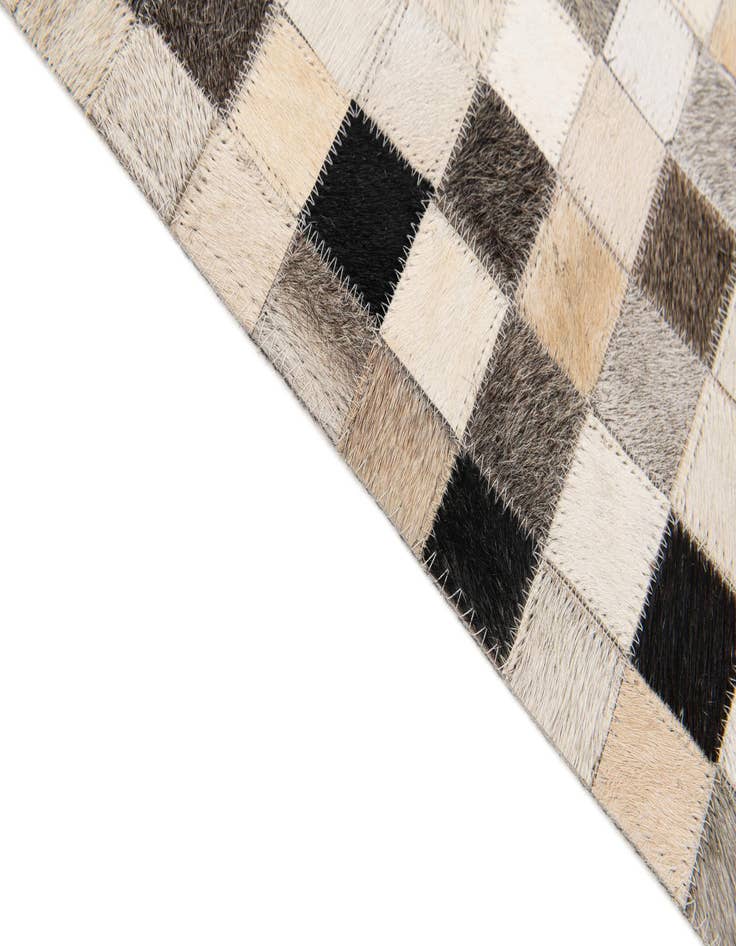 Detail image of  5' 2 x 8' Cowhide Stocks Rug