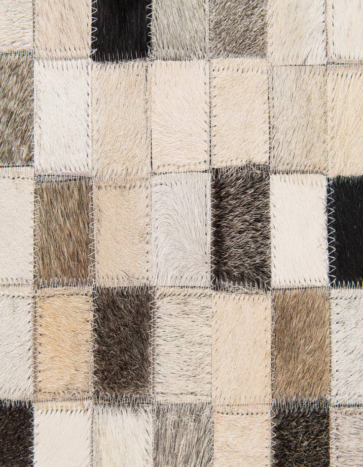Detail image of  5' 2 x 8' Cowhide Stocks Rug