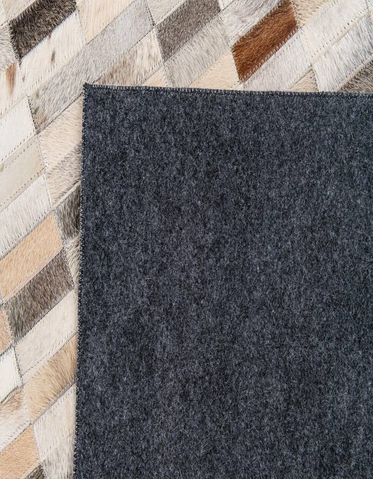 Detail image of  5' 1 x 7' 10 Cowhide Stocks Rug