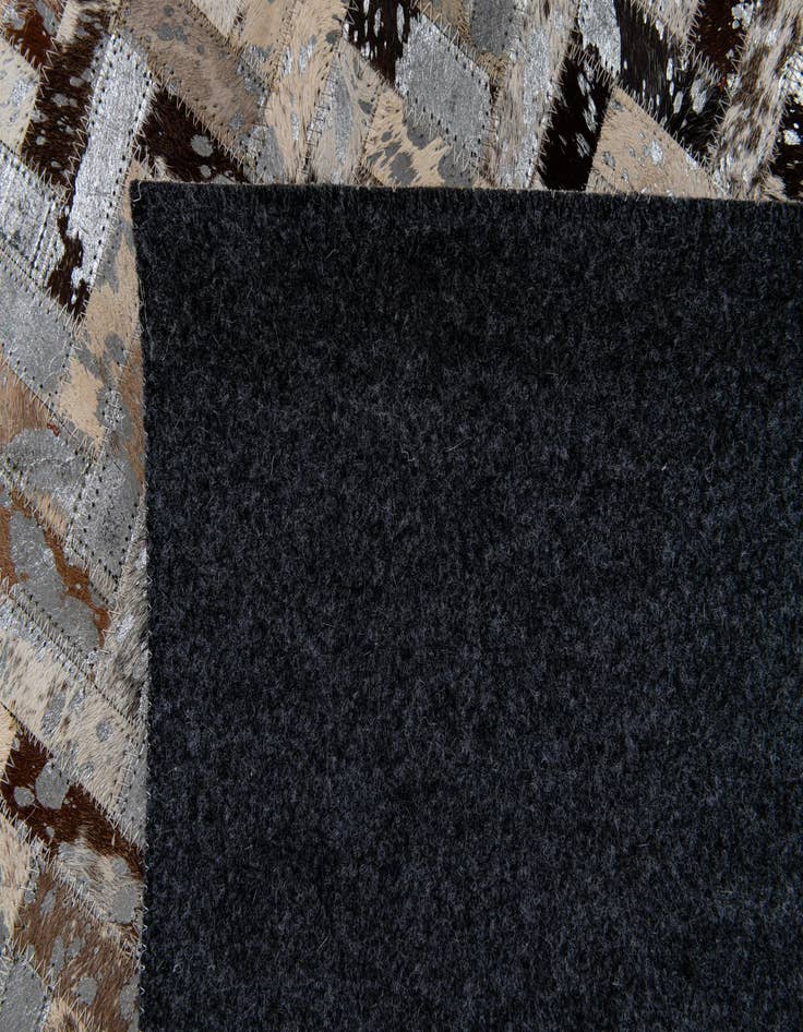 Detail image of  4' 10 x 7' 7 Cowhide Stocks Rug
