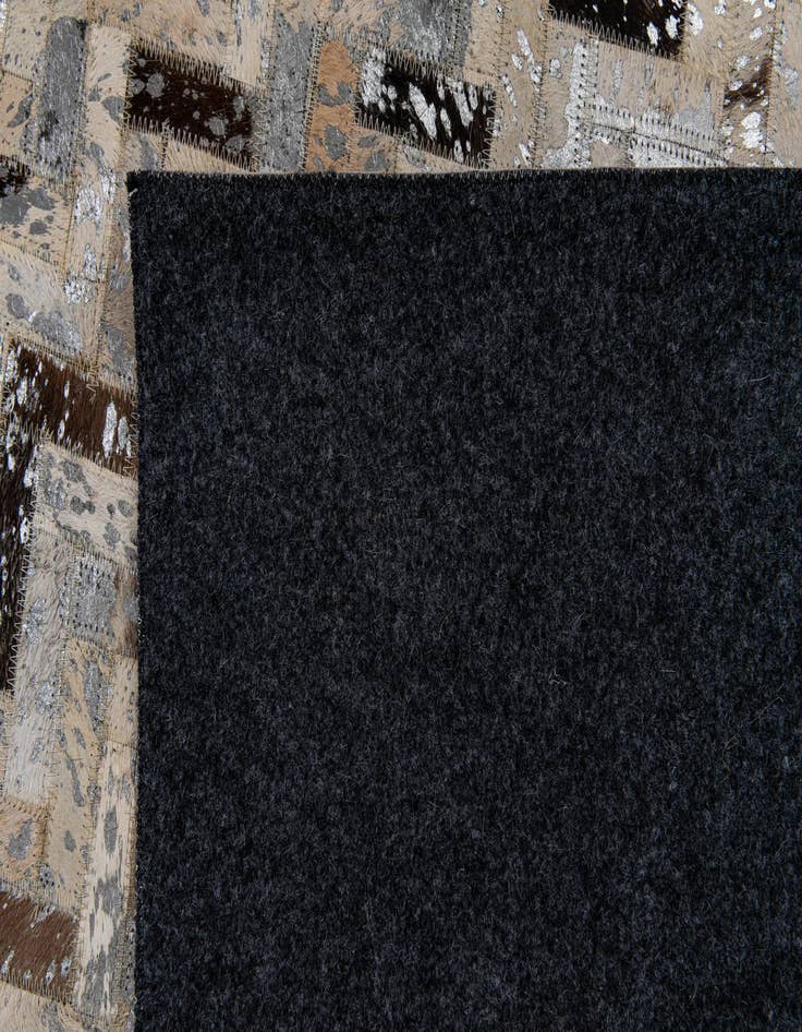 Detail image of  5' x 7' 7 Cowhide Stocks Rug