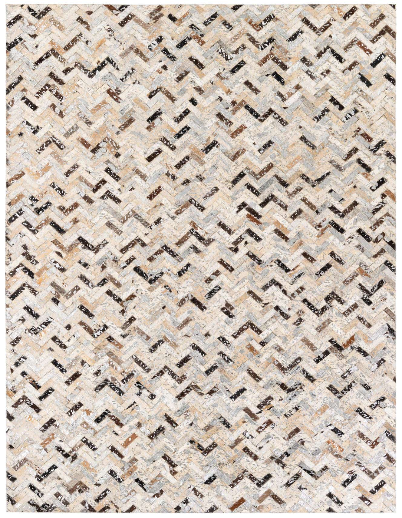 A 5x8 rectangular Cowhide Stocks rug by Rugs.com, featuring a modern multi-colored chevron pattern made from natural cowhide and leather, ideal for a living room.