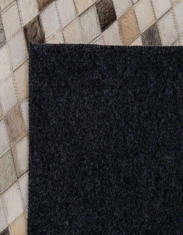Detail image of  5' x 8' Cowhide Stocks Rug