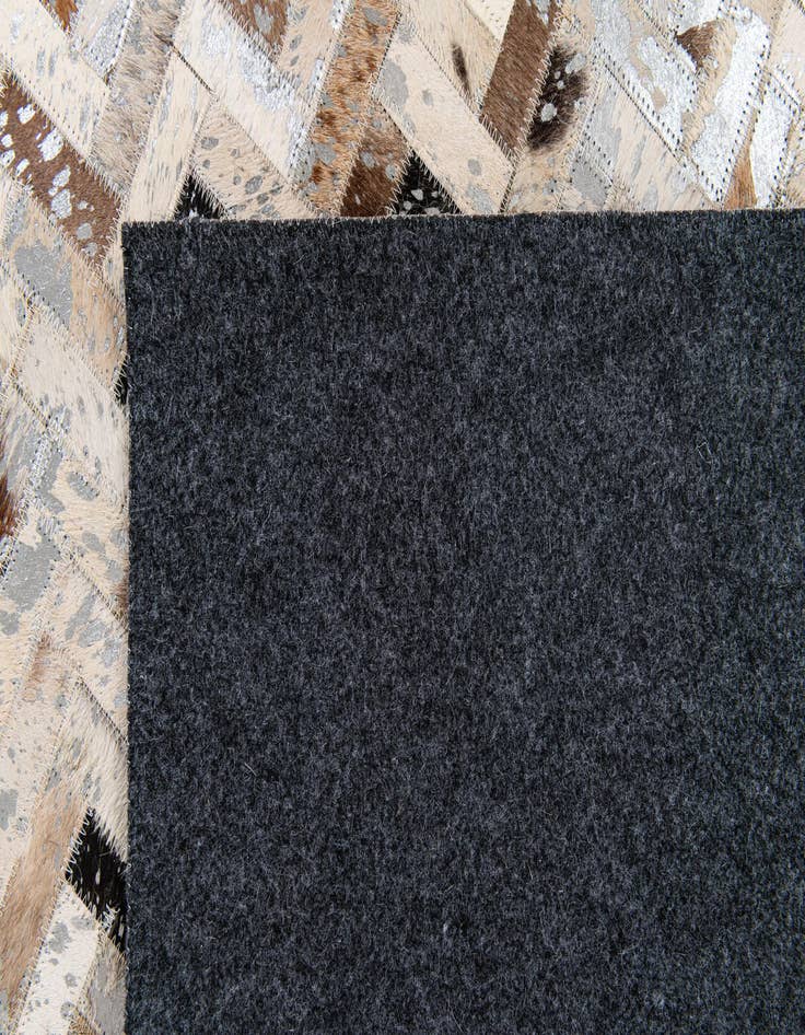 Detail image of  4' 10 x 7' 6 Cowhide Stocks Rug