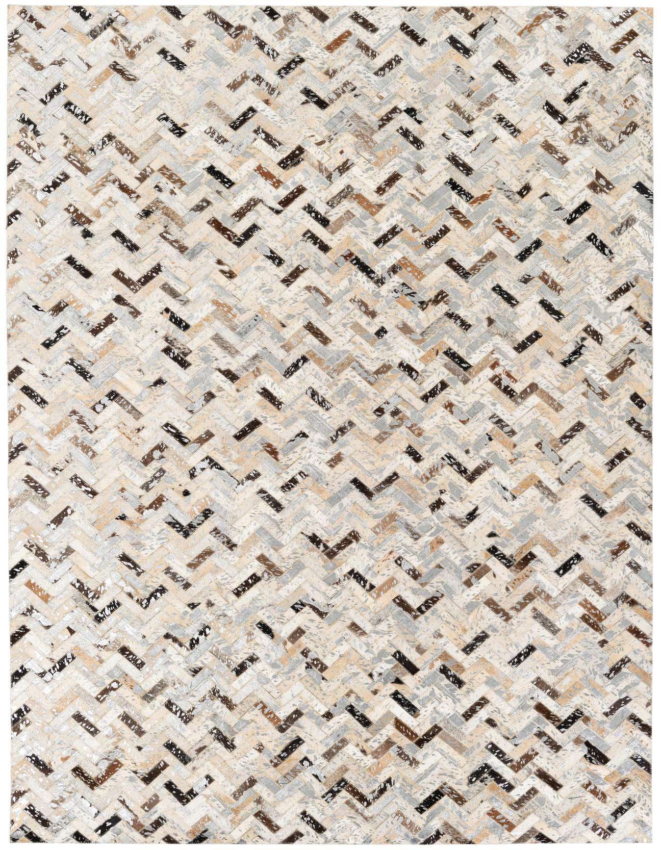 A rectangular 5x8 multi-colored cowhide rug with a modern chevron pattern in various natural shades of brown, black, and cream.