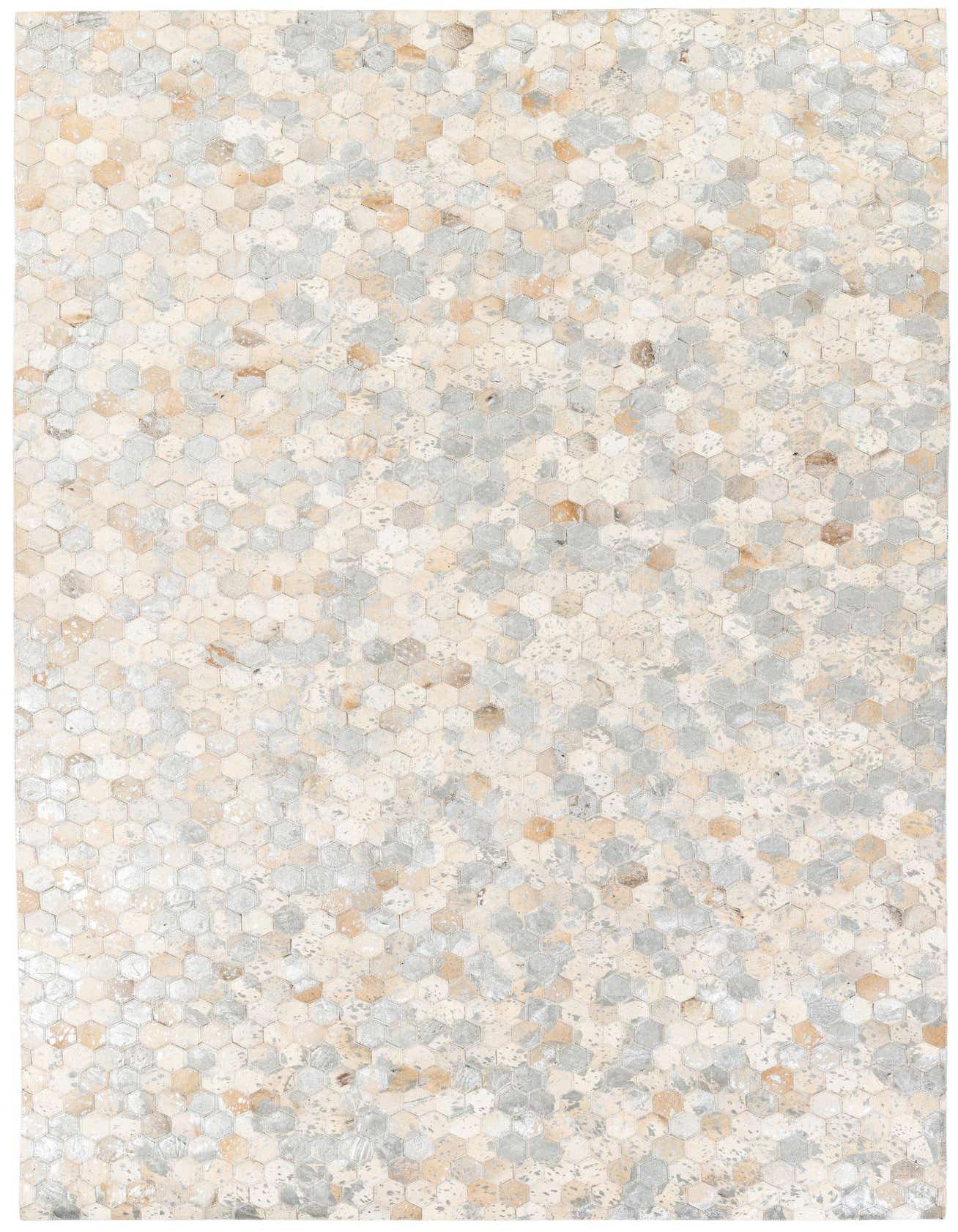 A 5x8 rectangular Cowhide Stocks rug featuring a modern multi-colored hexagonal pattern in beige, gray, and tan tones.