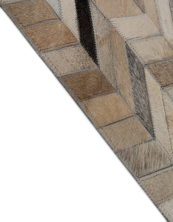 Detail image of  6' 8 x 9' 11 Cowhide Stocks Rug