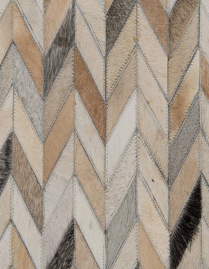 Detail image of  6' 8 x 9' 11 Cowhide Stocks Rug